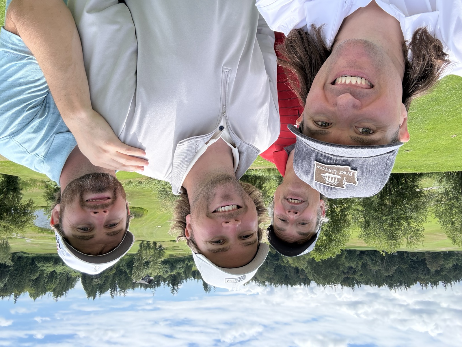 The foursome at a treed, hilly course